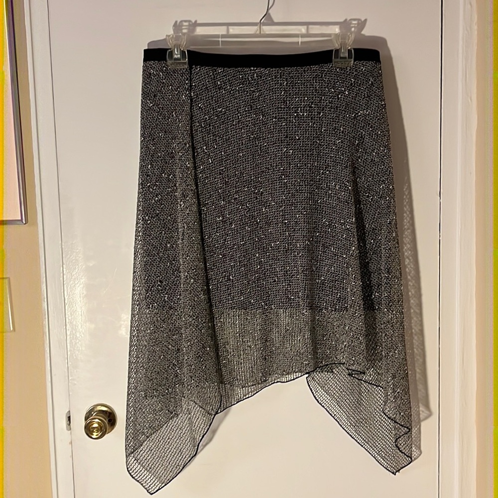 Mesh swing skirt over pencil underskirt